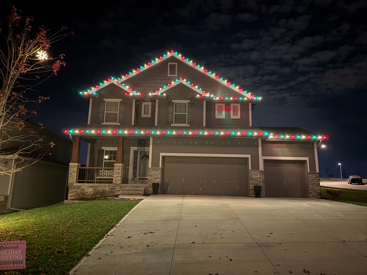 Professional holiday lighting installation on Omaha home