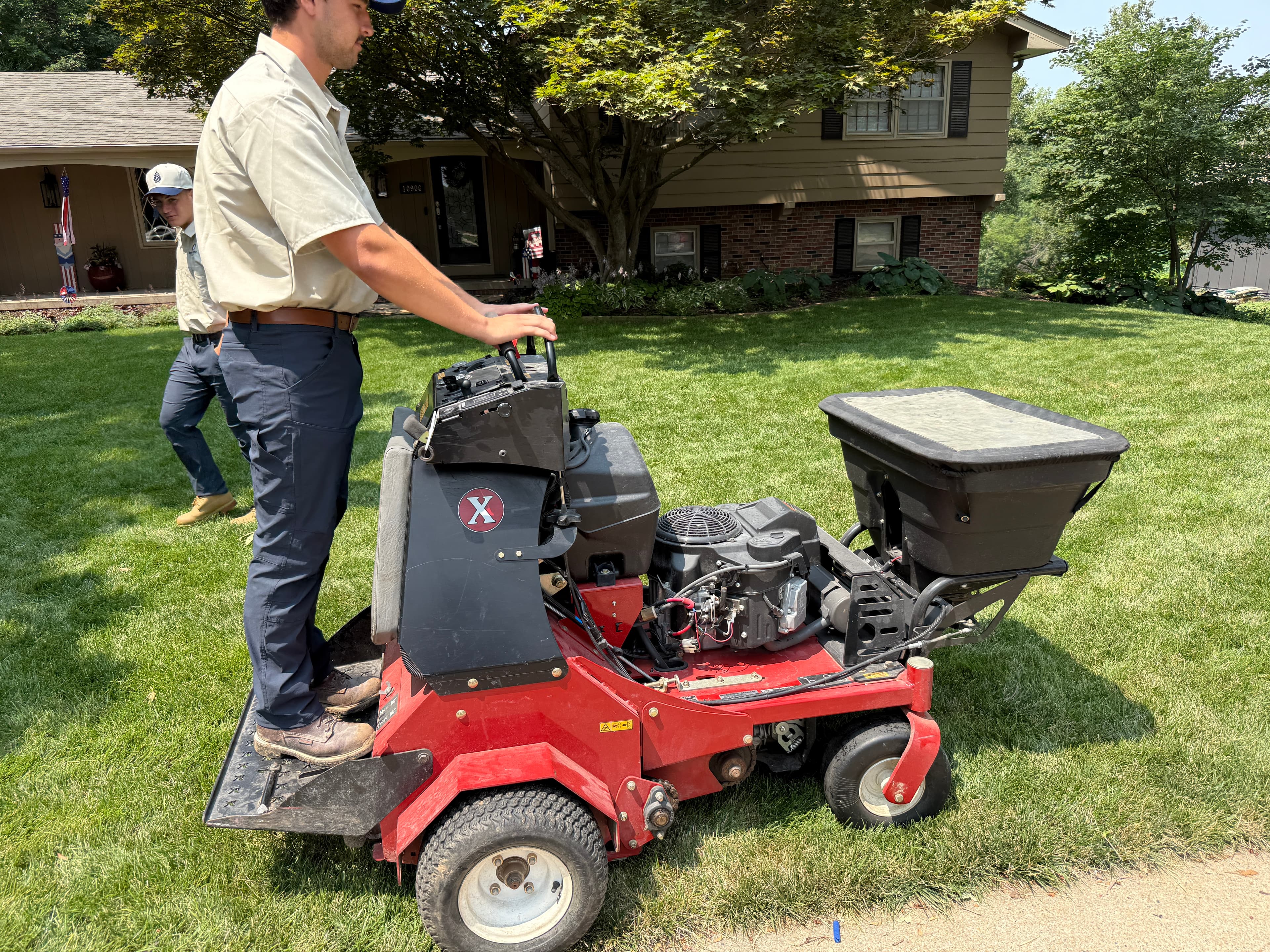 Why Lawn Edges and Driveways Green Up First in Omaha Yards